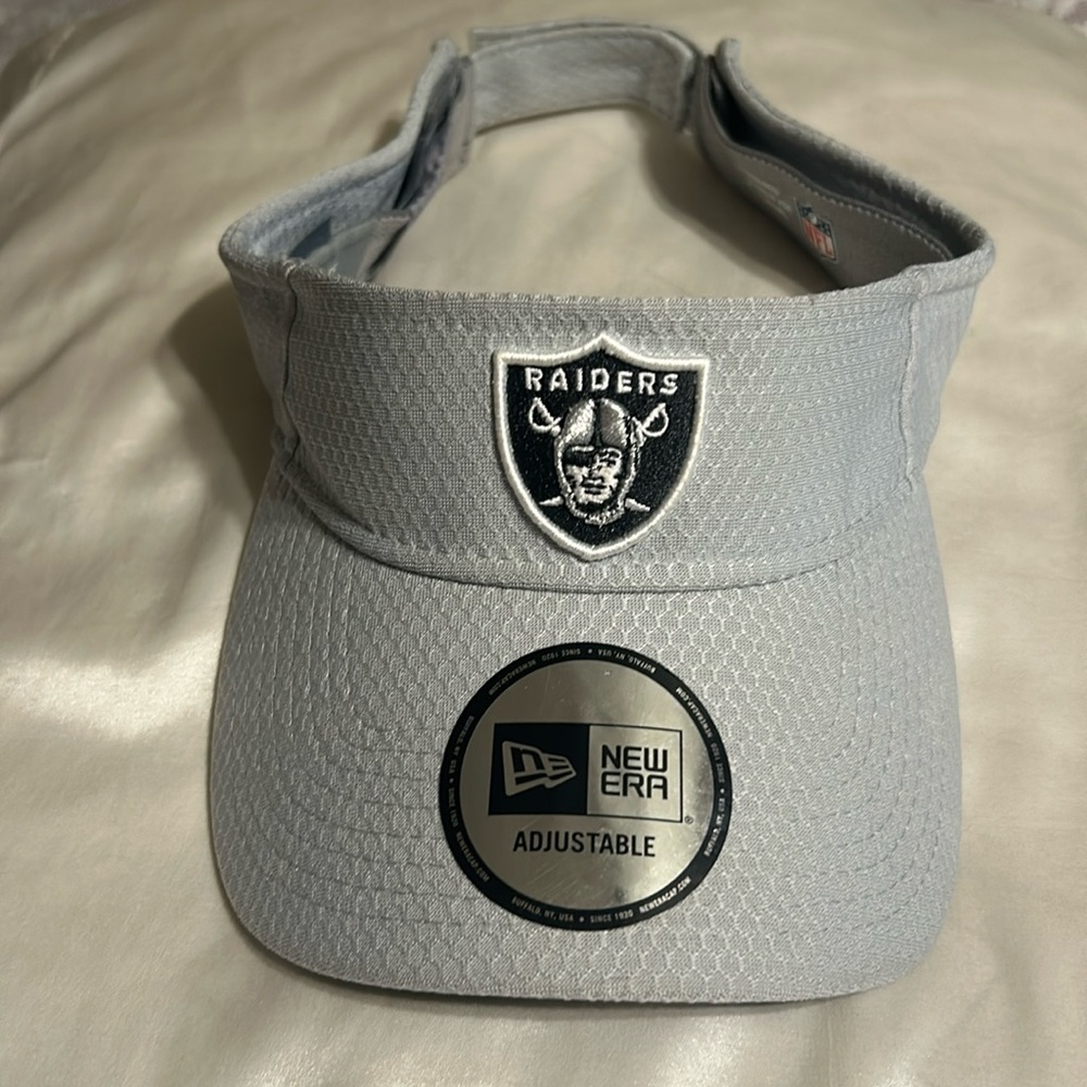 Raiders Adjustable Sun Visor. Brand new nev worn.